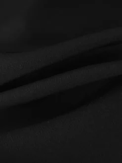 Robe courte évasée noire à bretelles et dos lacé 2026