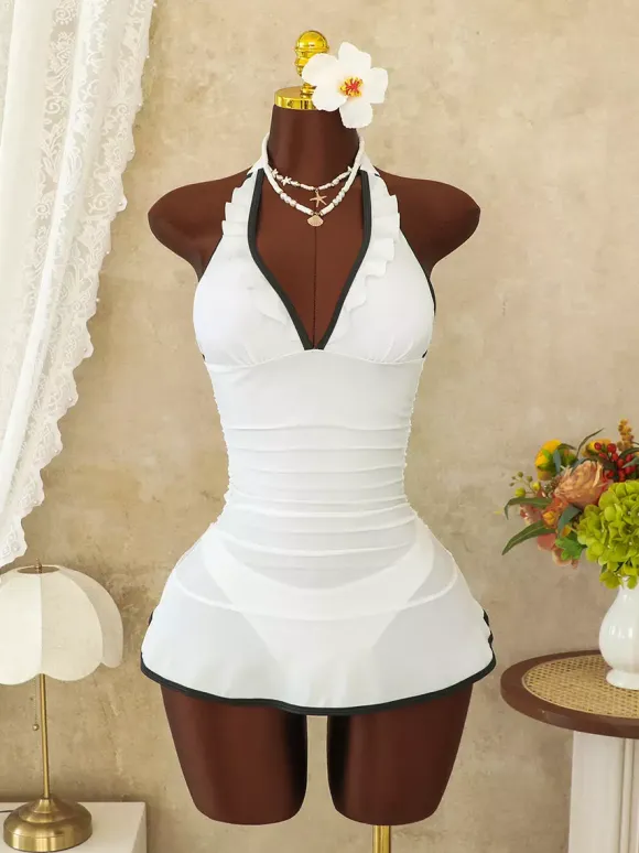 Robe de bain une pièce à volants dos nu et jupe froncée ornée de passepoils contrastants