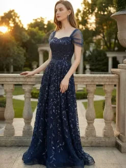 Robe de bal longue bleu profond à paillettes décolleté en c艙ur et épaules dénudées été 2026
