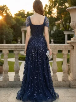 Robe de bal longue bleu profond à paillettes décolleté en c艙ur et épaules dénudées été 2026