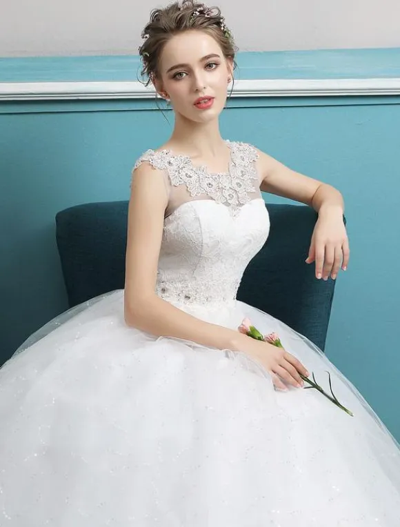 Robe de bal Princesse 2026 robes de mariée tulle dos nu ivoire perles longueur plancher robe de mariée