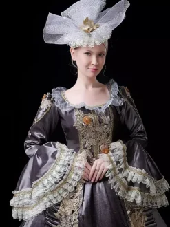 Robe de bal victorienne rococo vintage pour femme manches évasées ornées de dentelle.