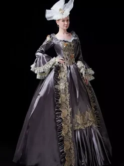 Robe de bal victorienne rococo vintage pour femme manches évasées ornées de dentelle.