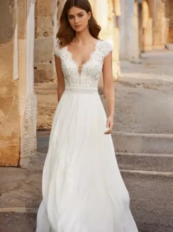 Robe de mariée bohème en dentelle robe de bal longueur au sol taille naturelle dos nu sans manches col en V ivoire