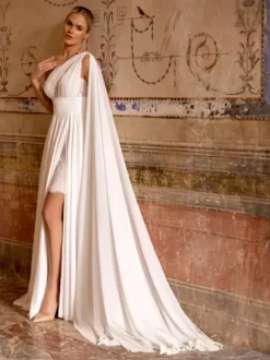 Robe de mariée bohème en mousseline de soie et dentelle deux pièces avec traîne taille naturelle fermeture éclair sans manches décolleté design ivoire