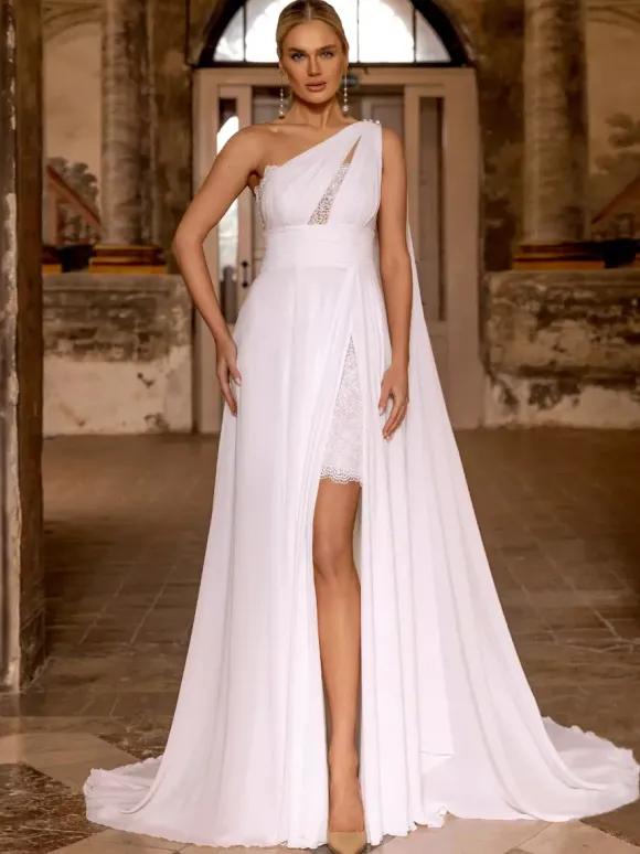 Robe de mariée bohème en mousseline de soie et dentelle deux pièces avec traîne taille naturelle fermeture éclair sans manches décolleté design ivoire
