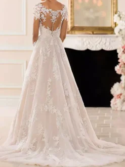 Robe de mariée col V manche longue en dentelle boutonné sur dos à traîne