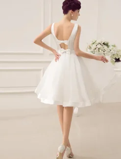 Robe de mariée courte robe mariage vintage col bateau noeud sur dos au genou
