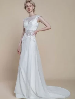 Robe de mariée deux pièces en dentelle décolleté illusion fourreau avec traîne fermeture éclair manches courtes longueur 30 cm ivoire