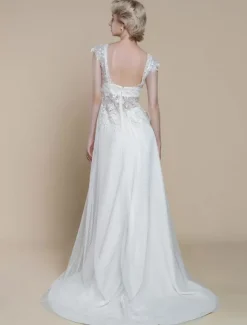 Robe de mariée deux pièces en dentelle décolleté illusion fourreau avec traîne fermeture éclair manches courtes longueur 30 cm ivoire
