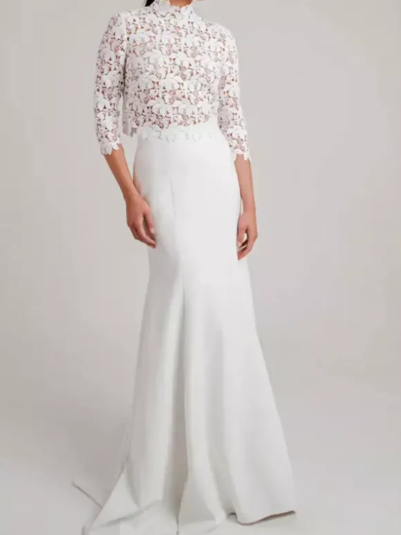 Robe de mariée deux pièces haut en dentelle col mantant manche longue jupe en jupe en satin à traîne