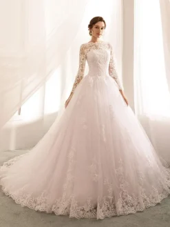 Robe de mariée princess en tulle ivoire manche longue en dentelle boutonné sur dos à traîne ronde Robe de mariage
