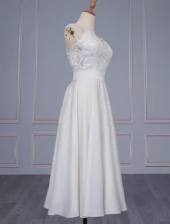 Robe de mariée simple à bretelle zip ou laçage sur dos jupe plissé robe de mariage