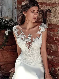 Robe de mariée simple ivoire col rond en dentelle sans manche jupe sirène à traîne Robe de mariage