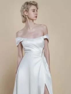 Robe de mariée simple robe de bal décolleté sans manches perles 20 cm