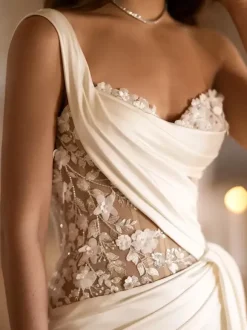 Robe de mariée simple sirène asymétrique sans manches en dentelle
