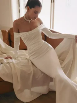 Robe de mariée sirène vintage bustier manche longue zip sur dos à petite traîne