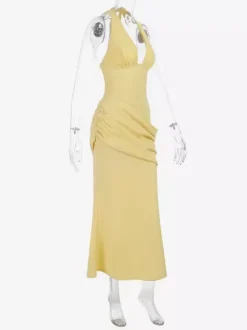 Robe de soirée jaune à col halter et décolleté plongeant style sirène dos lacé et taille froncée