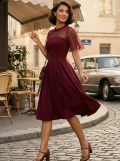 Robe de soirée élégante à manches transparentes et col rond ornée de patchwork en maille collection 2026