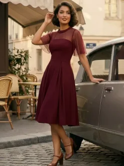 Robe de soirée élégante à manches transparentes et col rond ornée de patchwork en maille collection 2026