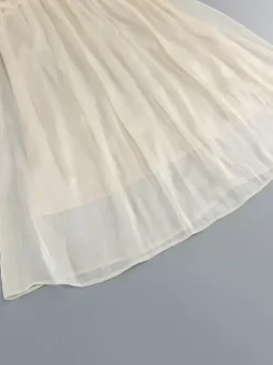 Robe de soirée longue abricot sans bretelles dos nu chic et semi-formelle