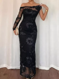 Robe de soirée maxi élégante noire asymétrique à une épaule en résille florale 3D coupe sirène moulante.