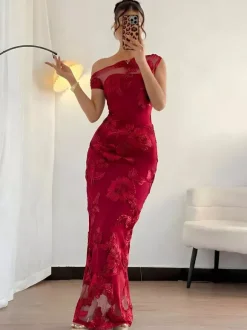 Robe de soirée maxi élégante noire asymétrique à une épaule en résille florale 3D coupe sirène moulante.