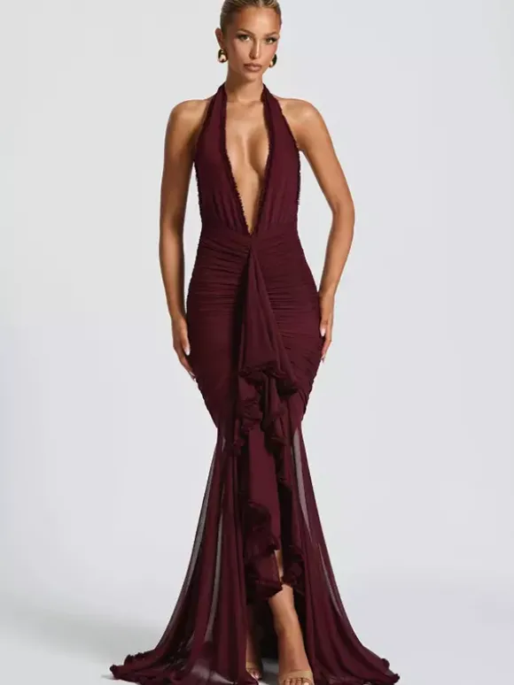 Robe de soirée maxi moulante à col en V profond et froncée dos nu collection 2026