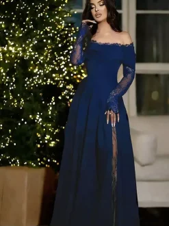 Robe de soirée maxi trapèze fendue manches longues et épaules dénudées en dentelle cils et dentelle cils