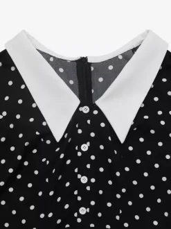 Robe de soirée mini fluide à pois col contrastant et manches longues coupe trapèze à pois.