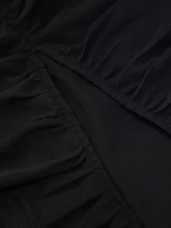 Robe de soirée noire dos nu décolleté c艙ur froncée et fendue robe midi pour boîte de nuit ou tenue de ville