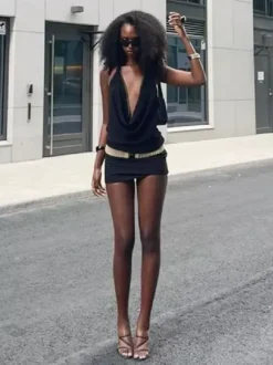 Robe de soirée noire moulante mini à dos nu et ornée de rivets tenue de boîte de nuit