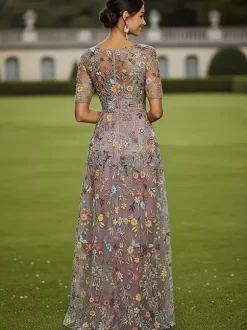 Robe de soirée pour la mère de la mariée col rond manches courtes coupe trapèze en dentelle idéale pour un mariage