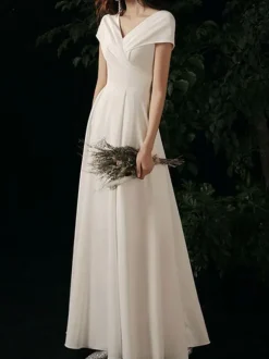 Robe de soirée trapèze col en V tissu satiné longueur au sol