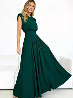 Robe de soirée vert émeraude cintrée et élégante avec jupe plissée parfaite pour les événements formels.