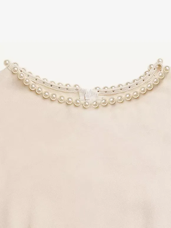 Robe de tous les jours décontractée mi-longue en satin crème sans manches encolure ornée de perles ceinture assortie robe habillée