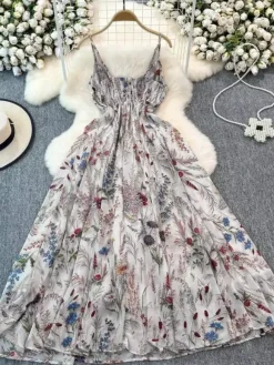 Robe de vacances maxi dos nu à fleurs bretelles fines sans manches imprimé floral col chic couleur abricot