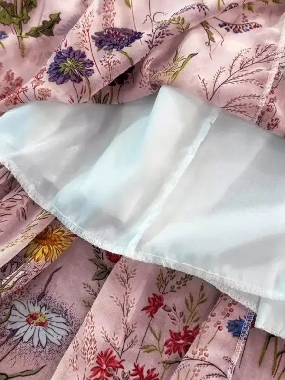 Robe de vacances maxi dos nu à fleurs bretelles fines sans manches imprimé floral col chic couleur abricot