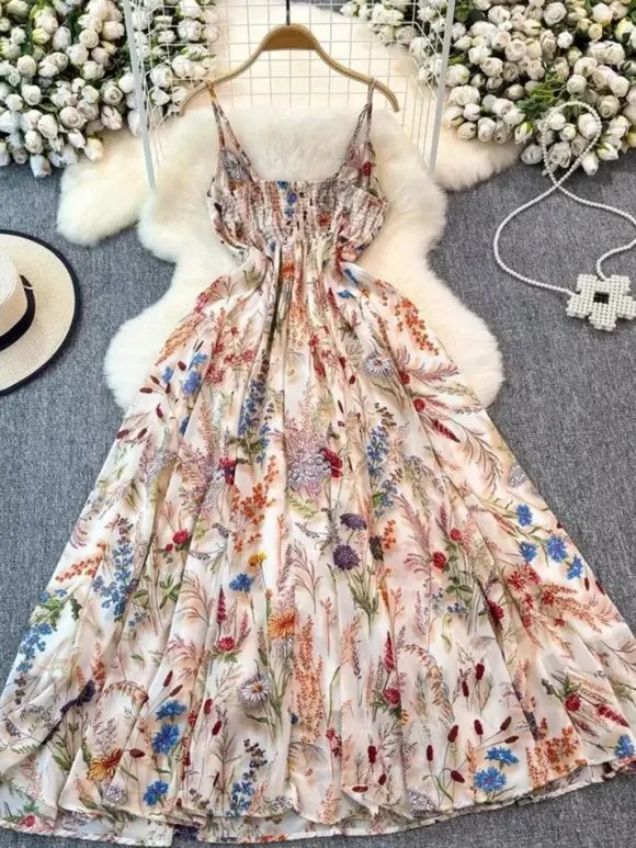 Robe de vacances maxi dos nu à fleurs bretelles fines sans manches imprimé floral col chic couleur abricot