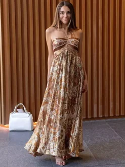Robe de vacances maxi fluide à imprimé cachemire dos nu et bustier taille découpée style jacquard.