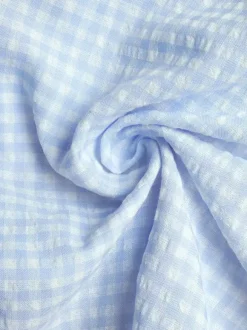 Robe d'été bleue mini à lacets sans manches et dos nu longueur genou idéale pour une soirée en amoureux