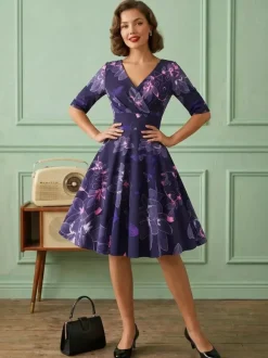 Robe glamour vintage noire style années 50 imprimé floral manches mi-longues superposées décolleté c艙ur taille M style rockabilly