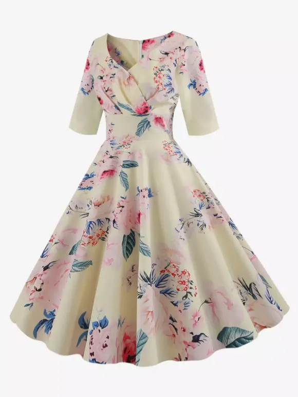 Robe glamour vintage noire style années 50 imprimé floral manches mi-longues superposées décolleté c艙ur taille M style rockabilly