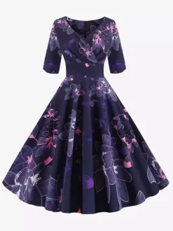 Robe glamour vintage noire style années 50 imprimé floral manches mi-longues superposées décolleté c艙ur taille M style rockabilly