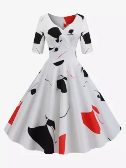 Robe glamour vintage noire style années 50 imprimé floral manches mi-longues superposées décolleté c艙ur taille M style rockabilly
