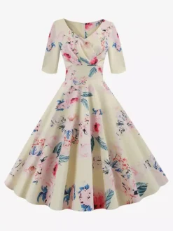Robe glamour vintage noire style années 50 imprimé floral manches mi-longues superposées décolleté c艙ur taille M style rockabilly