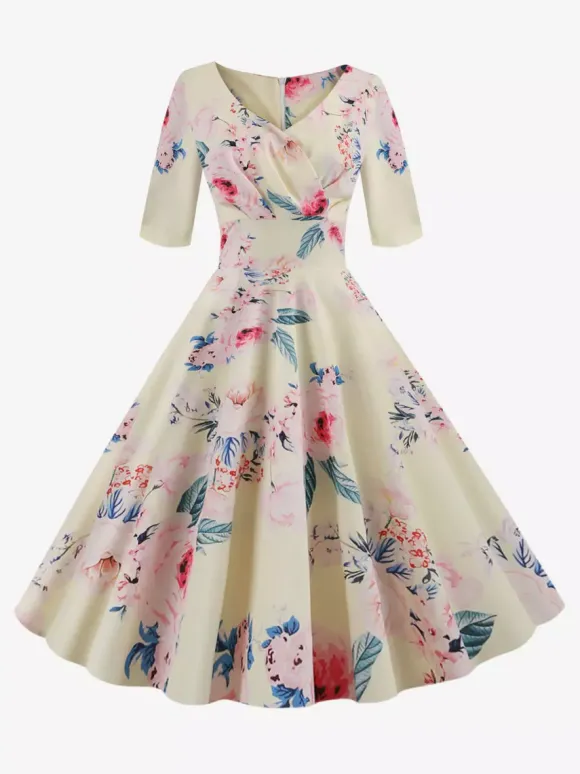 Robe glamour vintage noire style années 50 imprimé floral manches mi-longues superposées décolleté c艙ur taille M style rockabilly