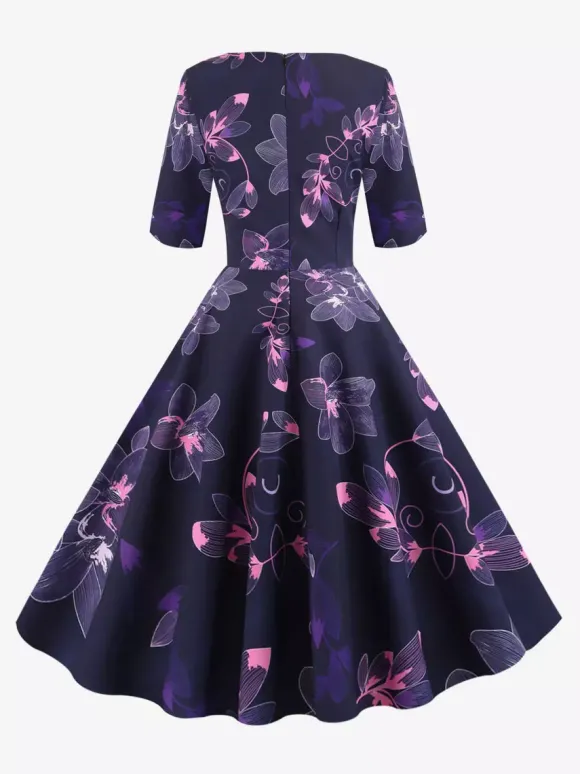 Robe glamour vintage noire style années 50 imprimé floral manches mi-longues superposées décolleté c艙ur taille M style rockabilly