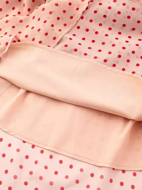 Robe imprimée rouge à fleurs sans manches col V et taille haute pour femme.