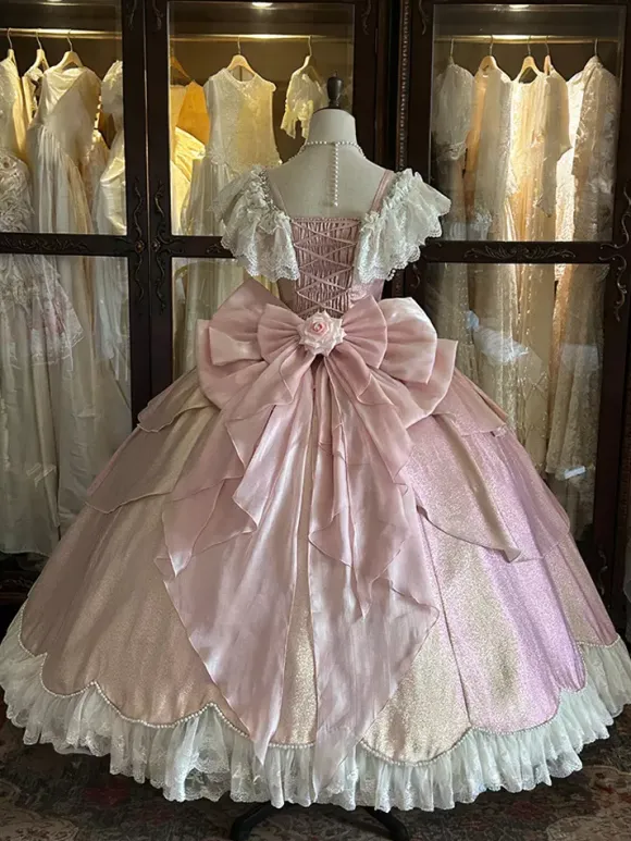 Robe Lolita féerique rose robe de bal ornée de perles et de fleurs n艙ud dans le dos bandage en dentelle manches en dentelle.